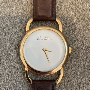 Anne Klein women’s gold and leather watch